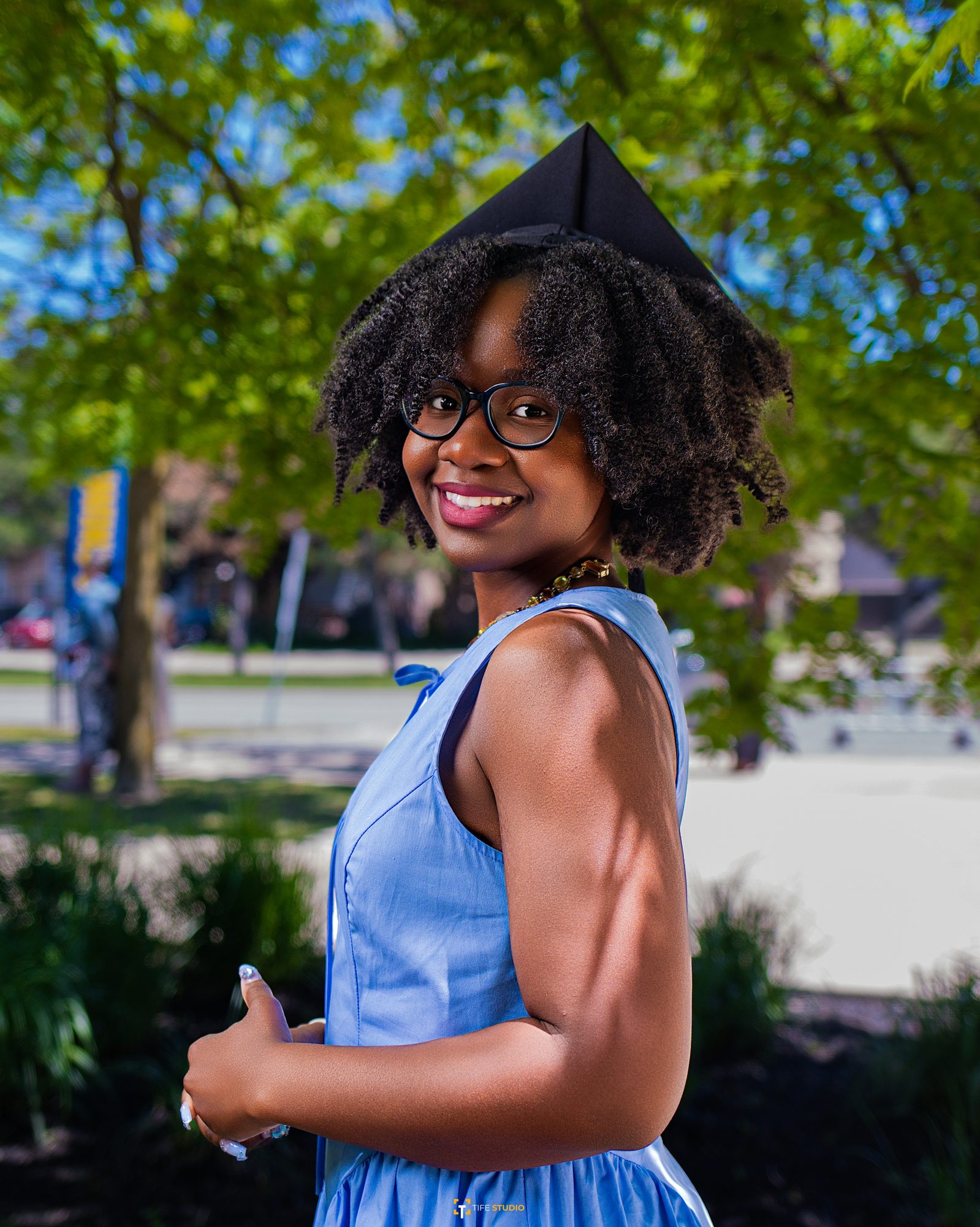 Graduate outdoor with flowers